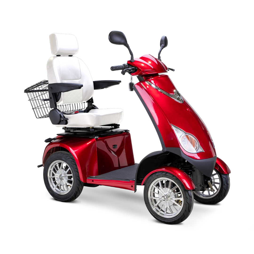 The Bespoke Platinum Recreational 4-Wheel Scooter with Electric Brake Assist features a red body, white cushioned high-back seat, armrests, handlebars, rearview mirrors, and a rear metal basket—perfect for comfortable mobility and recreation.